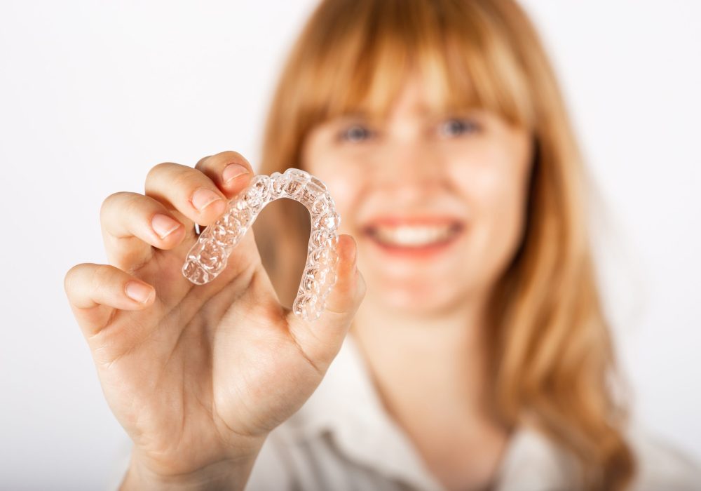 Happy,Young,Woman,With,Invisible,Teeth,Aligner.