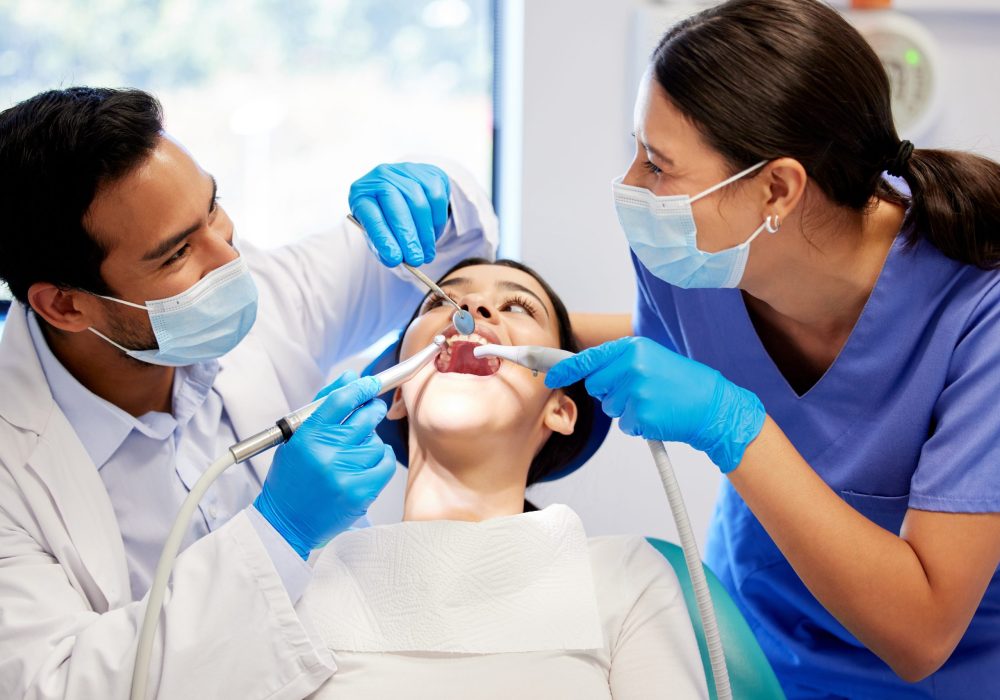 Dentist,,Team,And,Patient,In,Clinic,With,Equipment,For,Consultation,