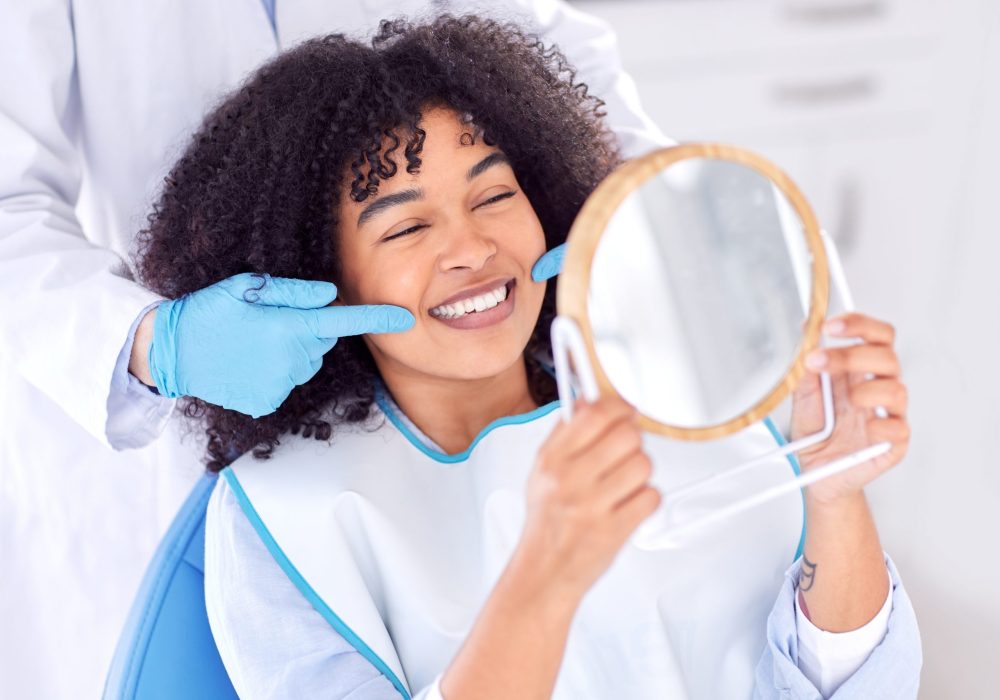 Woman,,Patient,And,Dentist,With,Mirror,For,Teeth,Whitening,In